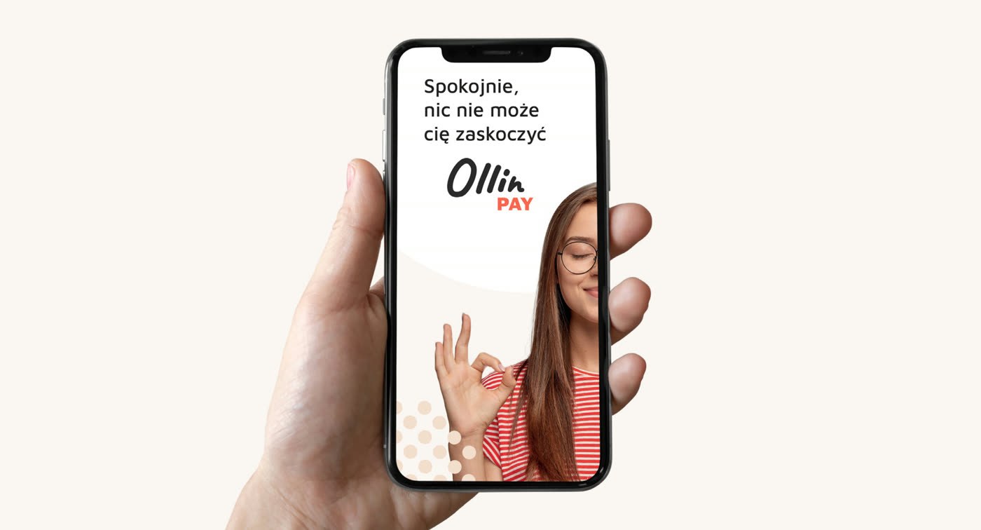 Key visual OllinPay na ekranie telefonu trzymanego w dłoni